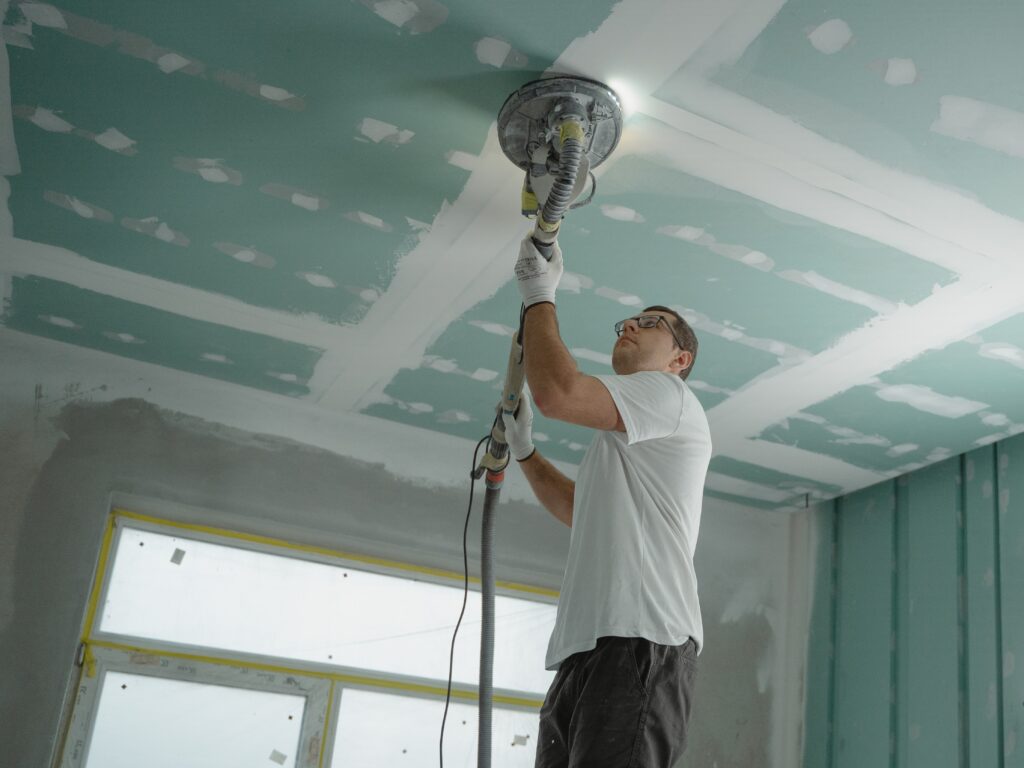 onstruction worker fishing ceiling
